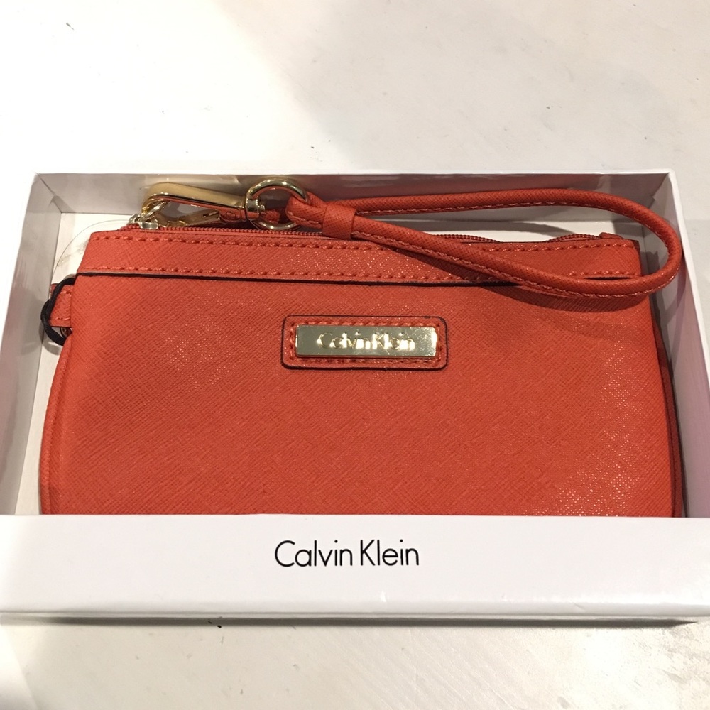 Calvin Klein Burnt orange wristlet